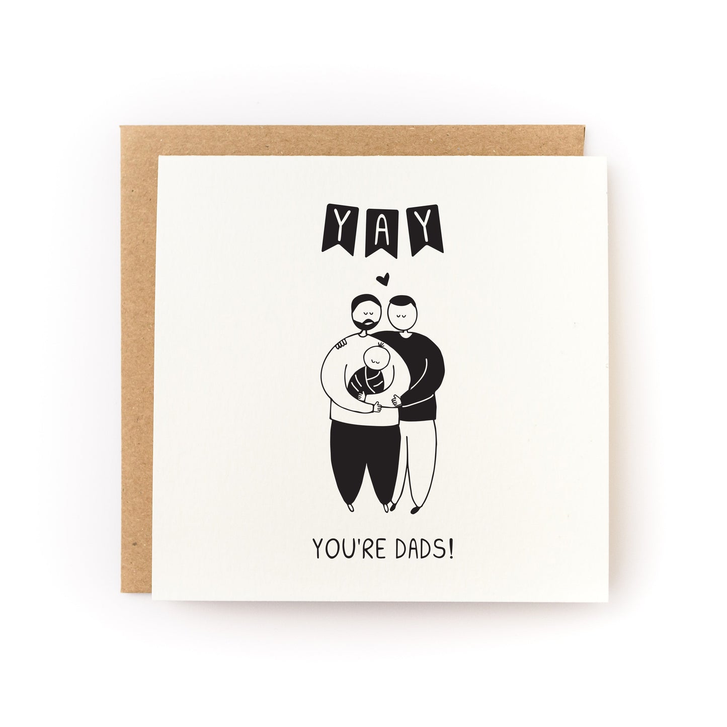 Yay You're Dads Letterpress Card with two dads holding a baby illustration, printed on soft white cardstock.
