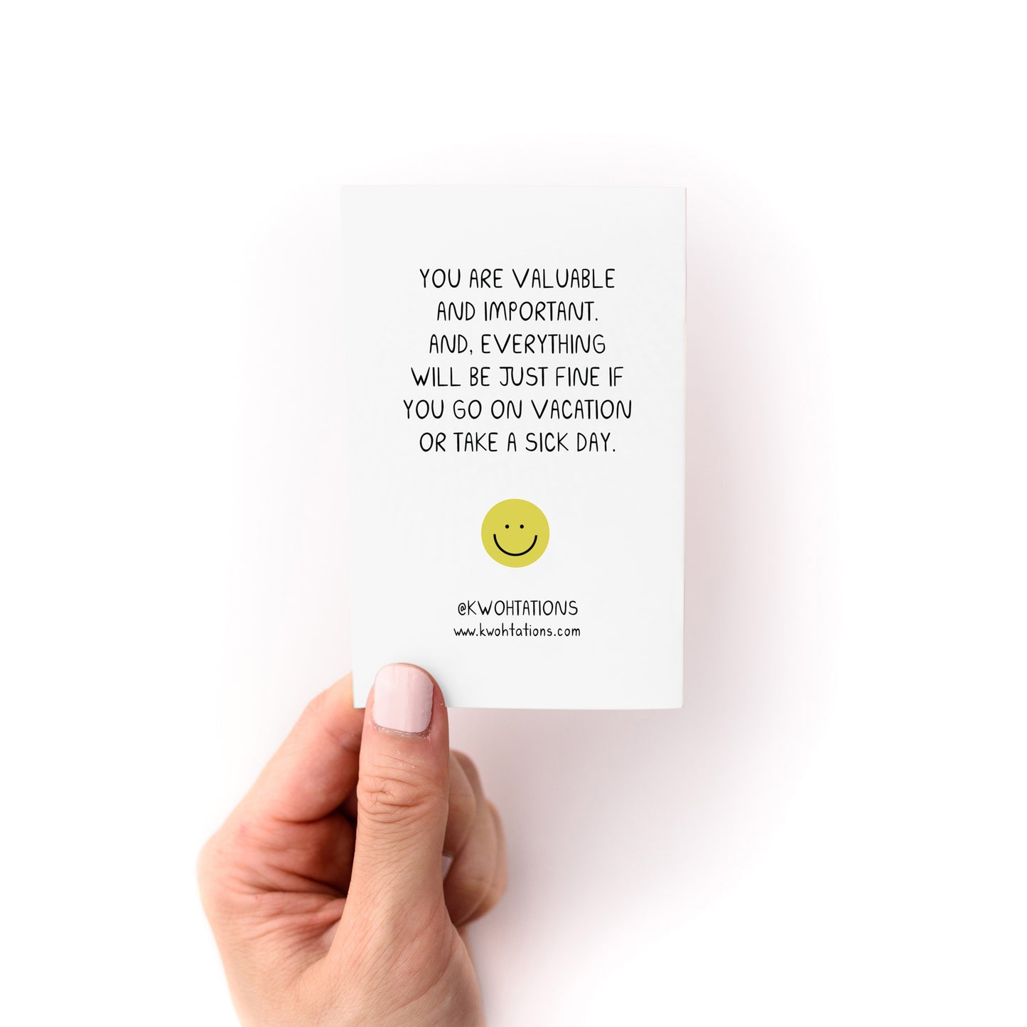 Hand holding a card with motivational text from the Working is Hard Zine by Kwohtations.