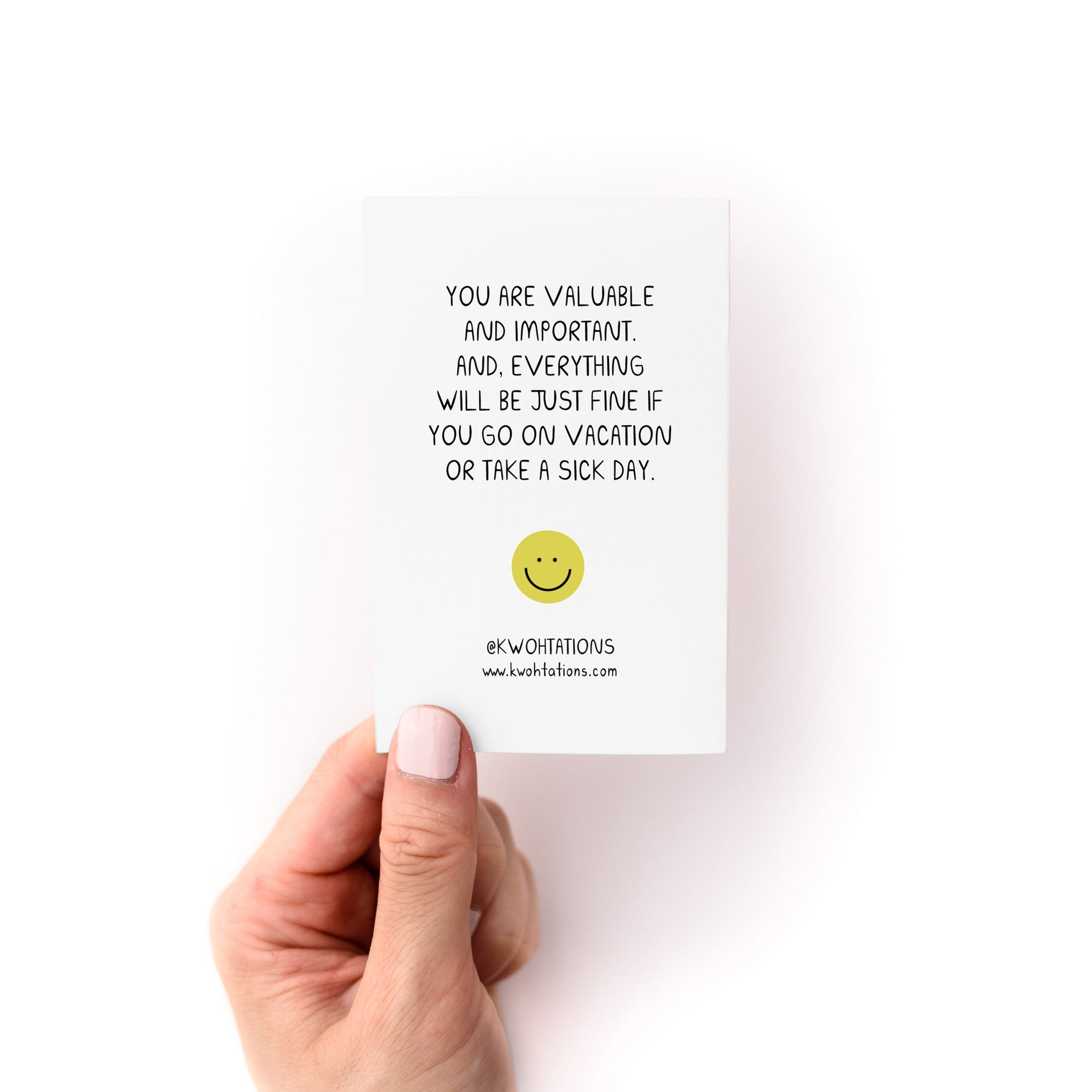 Hand holding a card with motivational text from the Working is Hard Zine by Kwohtations.