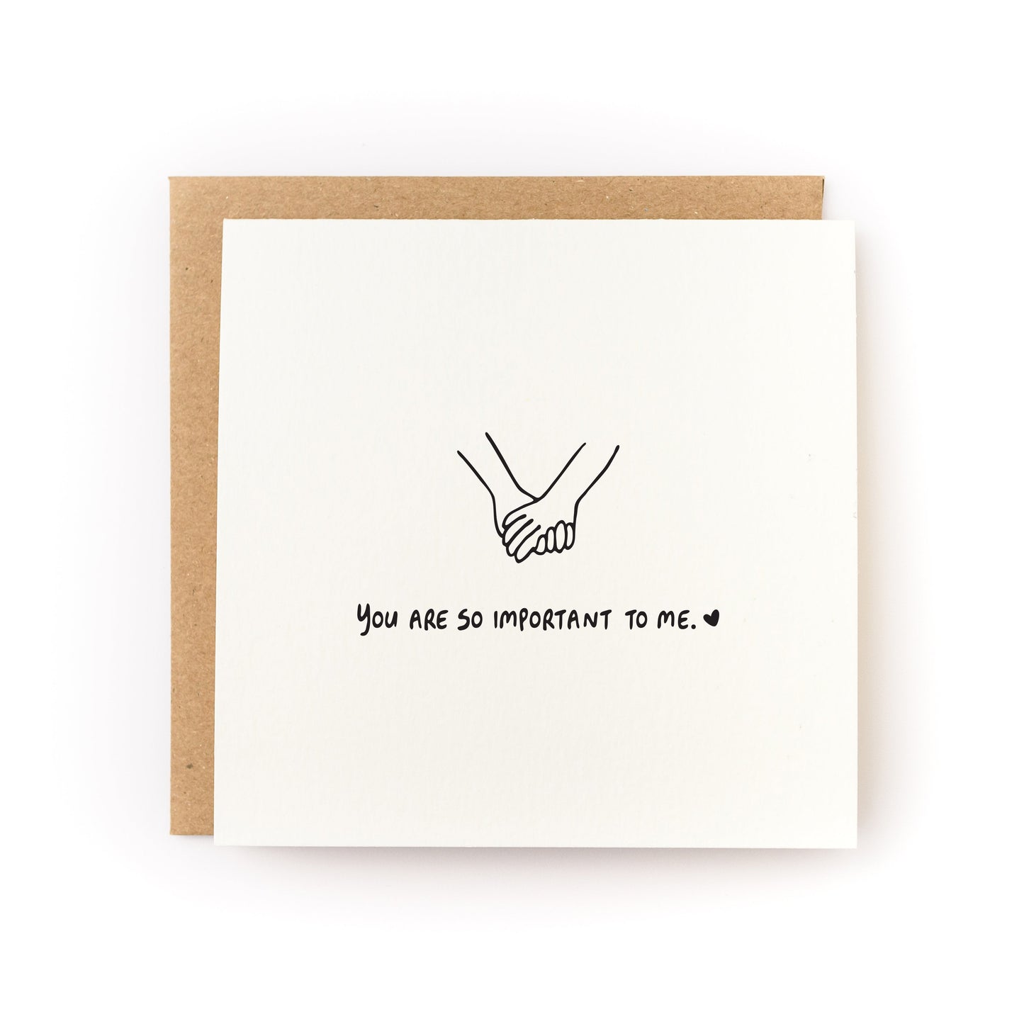 You Are So Important To Me Letterpress Card with hand-drawn holding hands and kraft envelope on white background