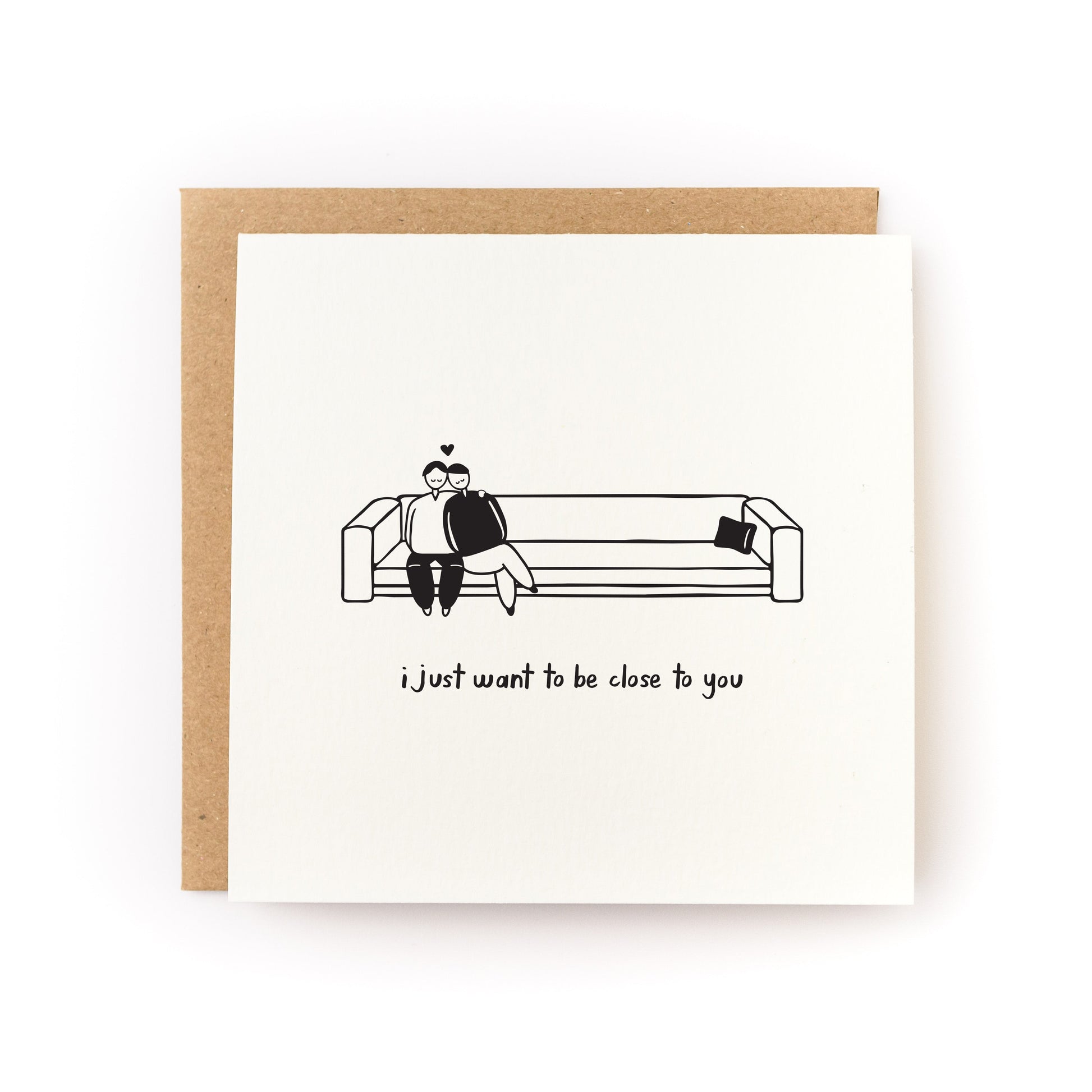Close to You Letterpress Card with a black and white illustration of a couple sitting close on a couch and text below.