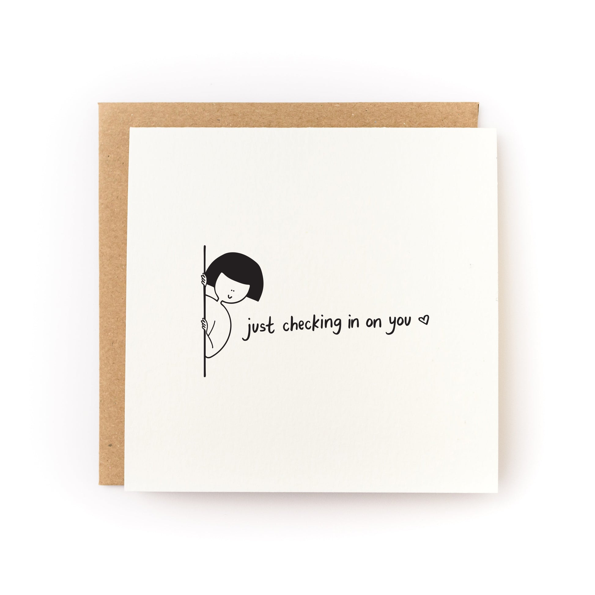 Just Checking In On You Letterpress Card with minimalist design and handwritten text on white cardstock with kraft envelope.