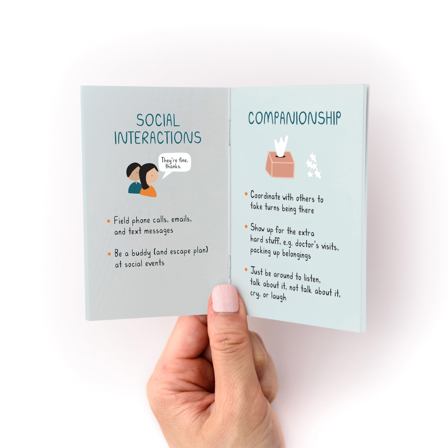 Hand holding the "How to Support Someone Zine" open to pages on social interactions and companionship tips.