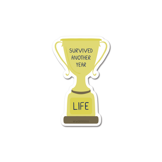Survived Another Year Trophy Sticker showing a golden trophy with text "Survived Another Year Life" on matte vinyl.