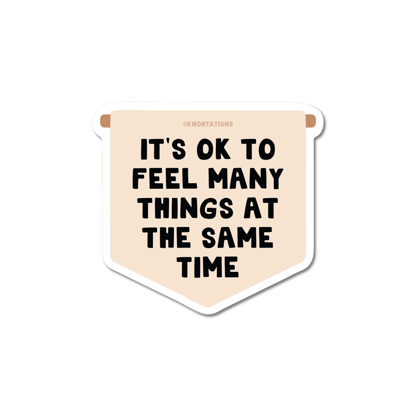 It's OK To Feel Many Things Banner Sticker with bold black text on beige die cut matte vinyl sticker design.