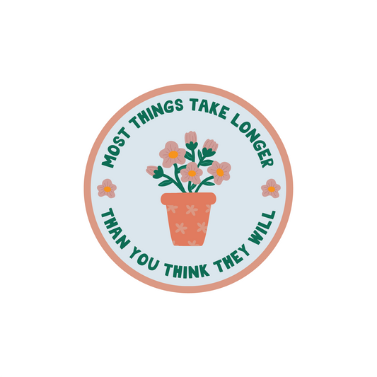 Things Take Longer Sticker with floral design and quote "Most things take longer than you think they will" in circle shape.