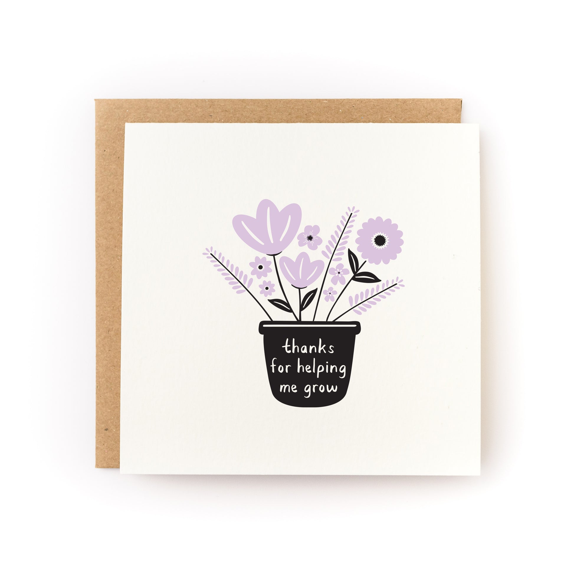 Thanks for Helping Me Grow Letterpress Card with purple flowers in black pot and kraft envelope on white background
