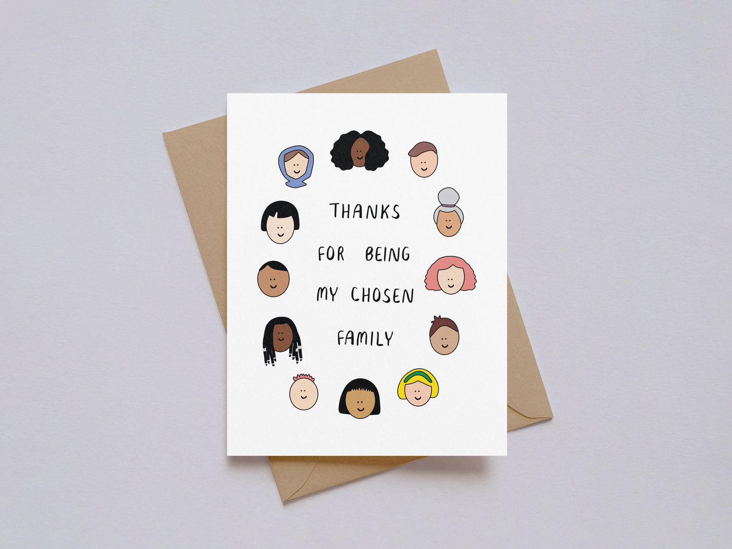 Thank You card with diverse illustrated faces surrounding the text "Thanks for being my chosen family" on white background