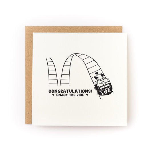 Enjoy the Ride Wedding Letterpress Card featuring a rollercoaster design with congratulations message and recycled kraft envelope.