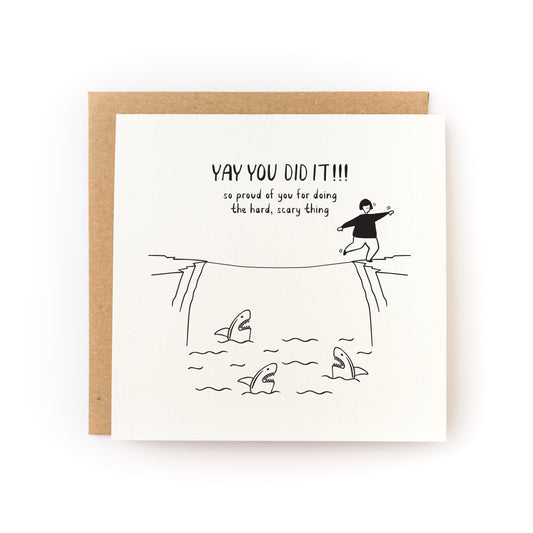 Doing the Hard Scary Thing Encouragement Letterpress Card with tightrope walker and sharks design celebrating bravery.