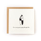 Sorry You're Going Through This Letterpress Card showing two people hugging with sympathy message on white cardstock.