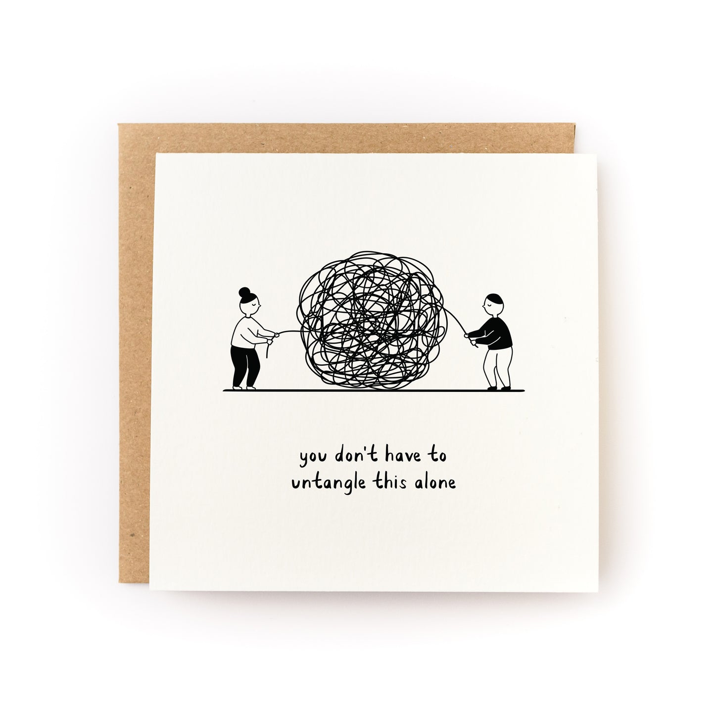 Sympathy card with illustration of two people untangling a large scribble and text "you don't have to untangle this alone