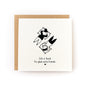I'm Glad We're Friends Letterpress Card with black illustration and message on white cardstock paired with kraft envelope.