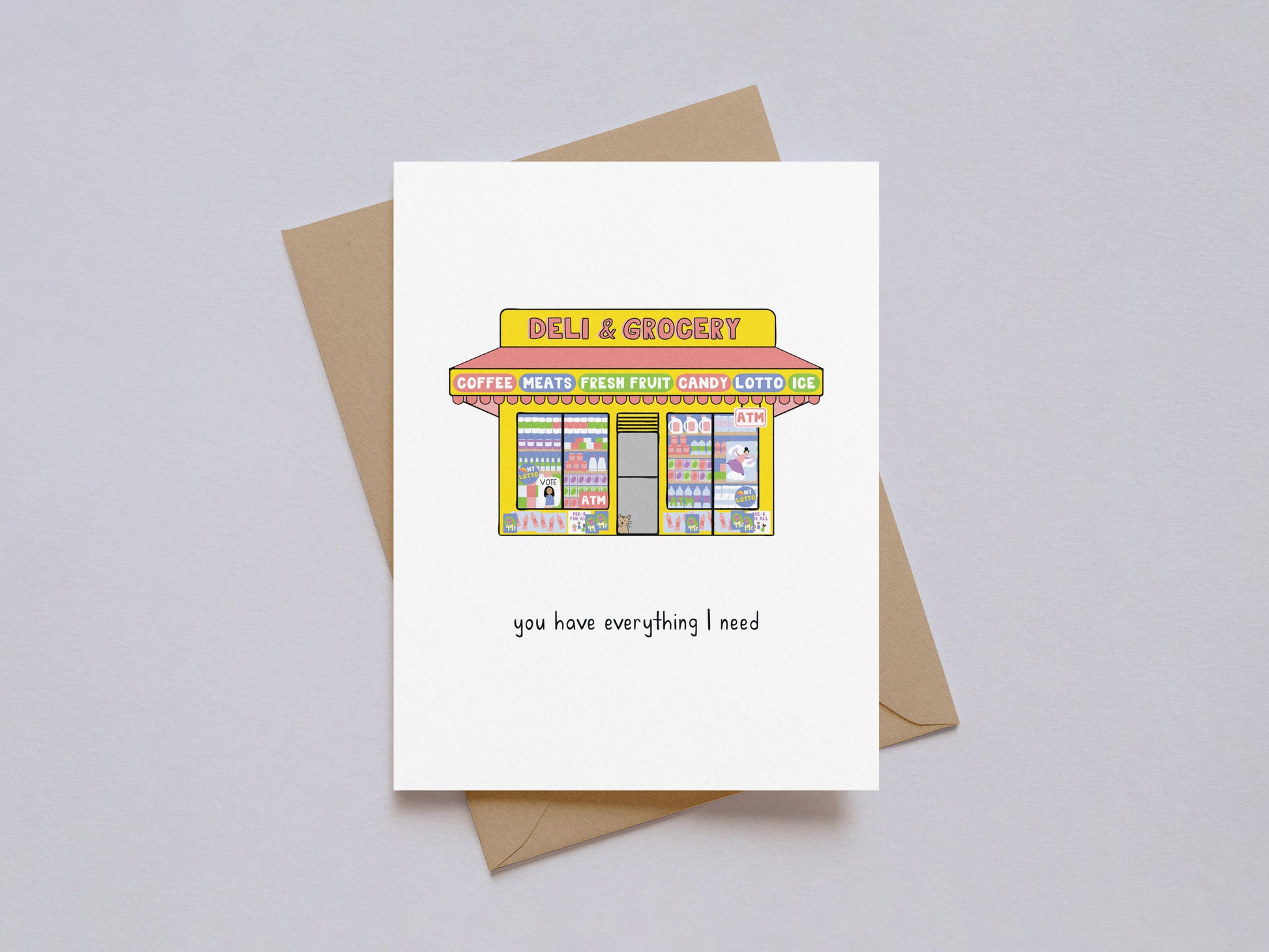 Illustrated NYC bodega storefront with colorful signs and text "you have everything I need" on white card with kraft envelope.
