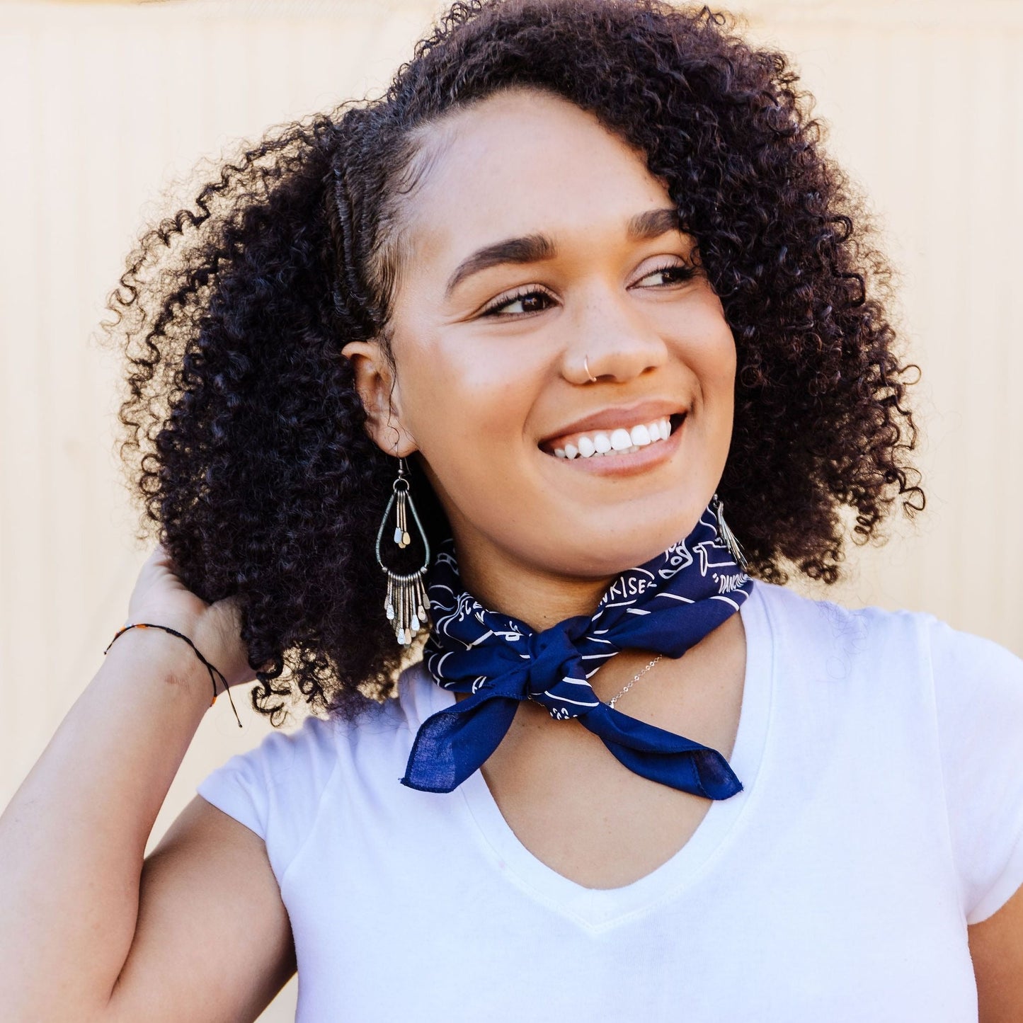 Person wearing tied up Not Everything is Terrible screen printed bandana