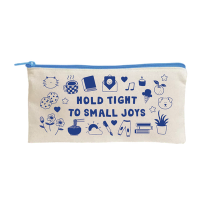 Beige fabric pouch with a blue zipper, featuring blue illustrations including a cat face, coffee cup, book, smiley face envelope, music note, candle, ice cream, fruit, dog face, flowers, noodles, sun, paintbrush, pants, books, and a potted plant, surrounding the phrase "Hold Tight to Small Joys.