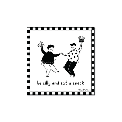 Illustration of two people dancing playfully inside a checkered border, one holding a slice of pizza and the other a cupcake, with the handwritten text "be silly and eat a snack.