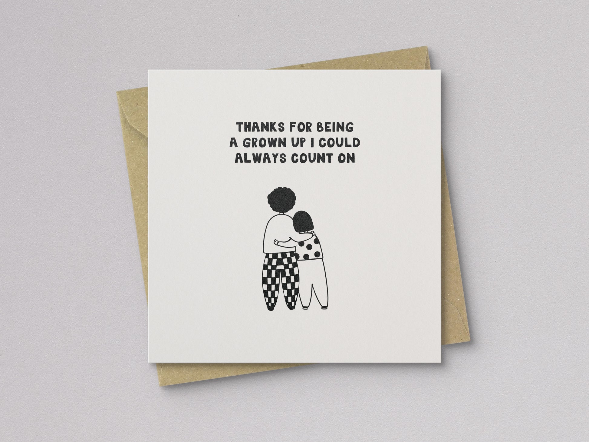 Mother’s Day card with black and white illustration of two people hugging and text thanking a grown-up you can count on