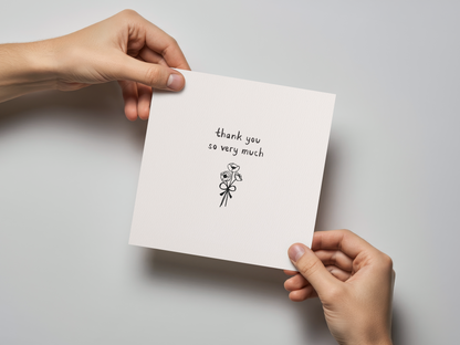 Square off-white thank you card held by two hands, featuring a minimalist black line drawing of a small flower bouquet tied with a bow and handwritten text reading "thank you so very much" on a textured background.