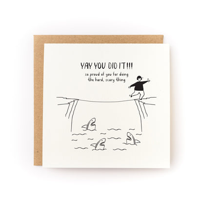 Doing the Hard Scary Thing Encouragement Letterpress Card with tightrope walker and sharks design celebrating bravery.