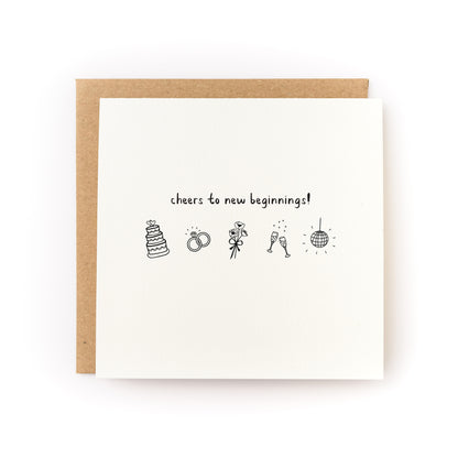 Folded wedding card with black illustrations of cake, rings, flowers, clinking glasses, and disco ball on white background