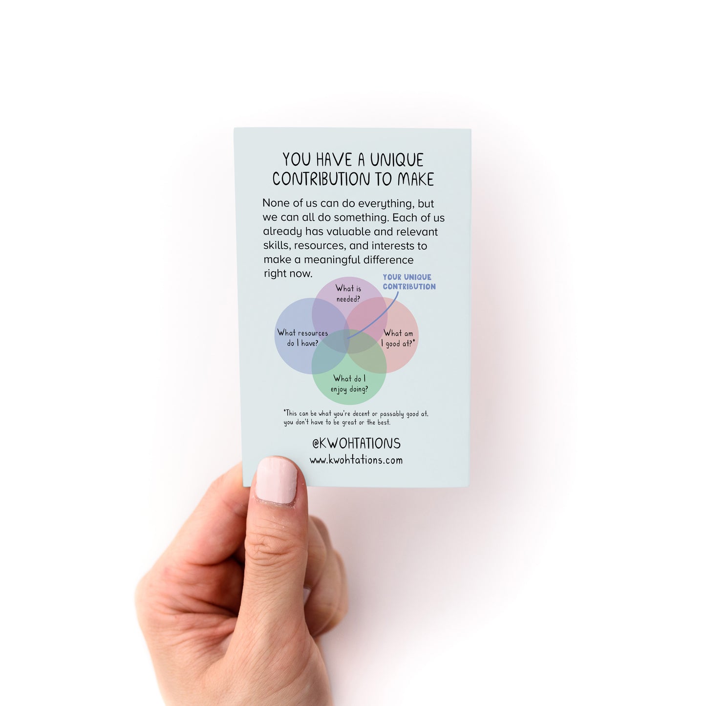 Hand holding a small booklet titled "You Have a Unique Contribution to Make" with a colorful Venn diagram on a white background.