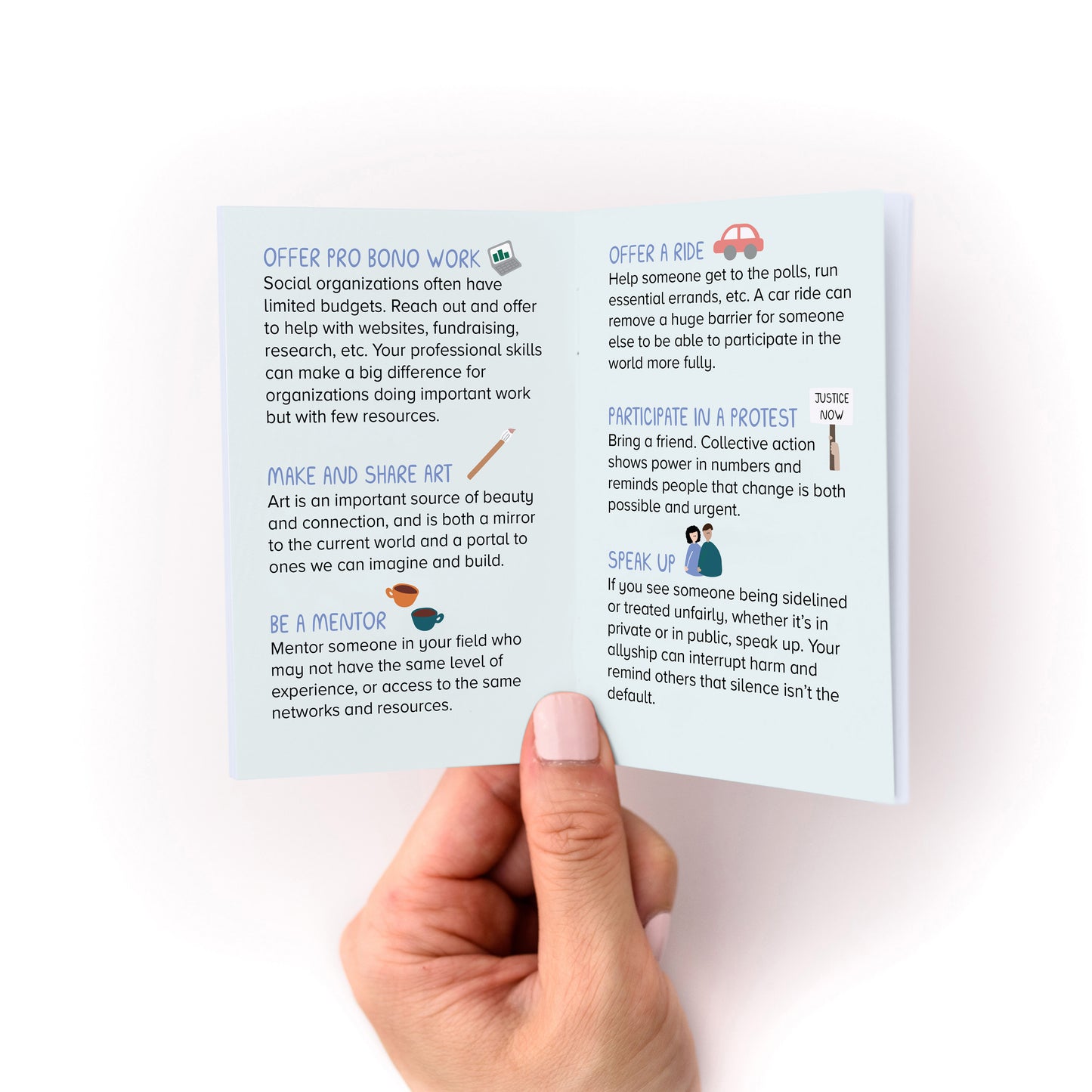 Hand holding an open pocket booklet titled Ways to Make a Positive Impact with text and small icons on white background