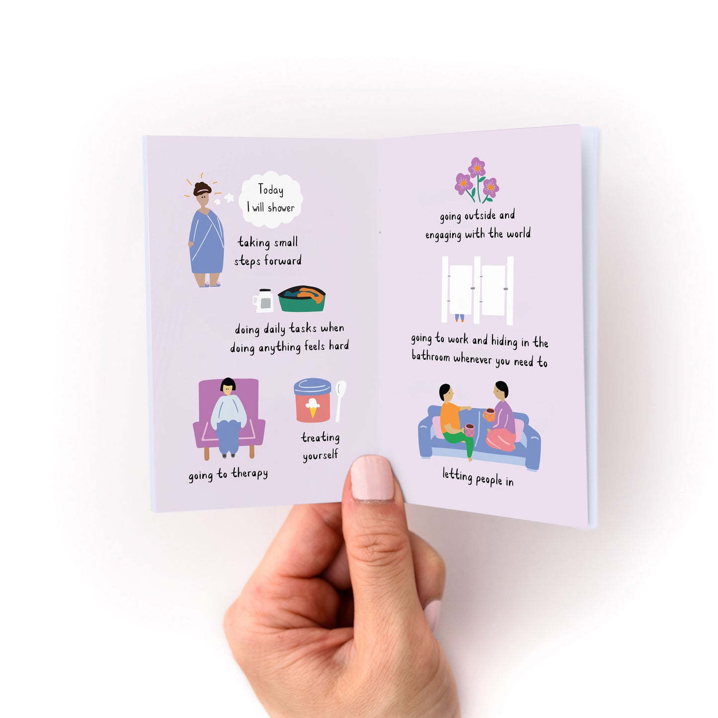 Hand holding an open pocket booklet titled What Resilience Looks Like with illustrated self-care and coping reminders on lavender pages